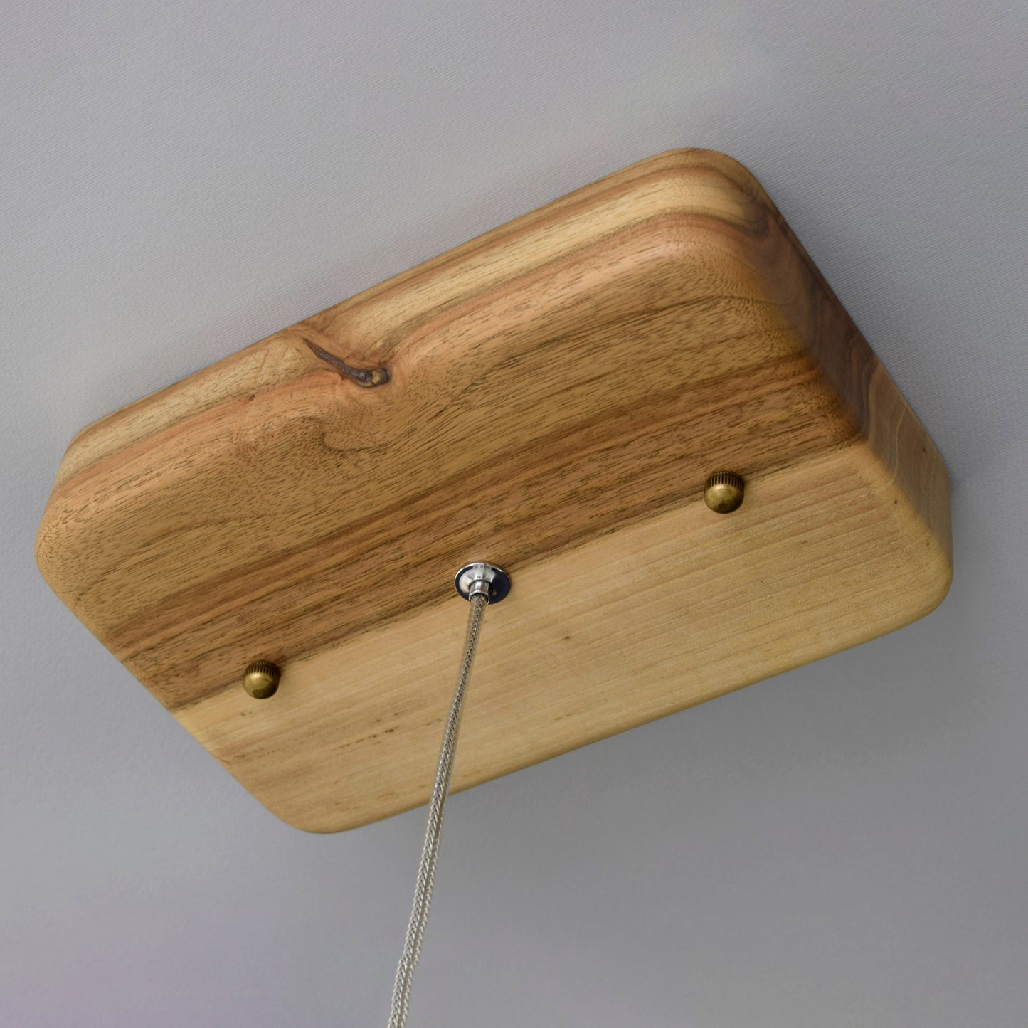 fastening of a chandelier made of solid walnut