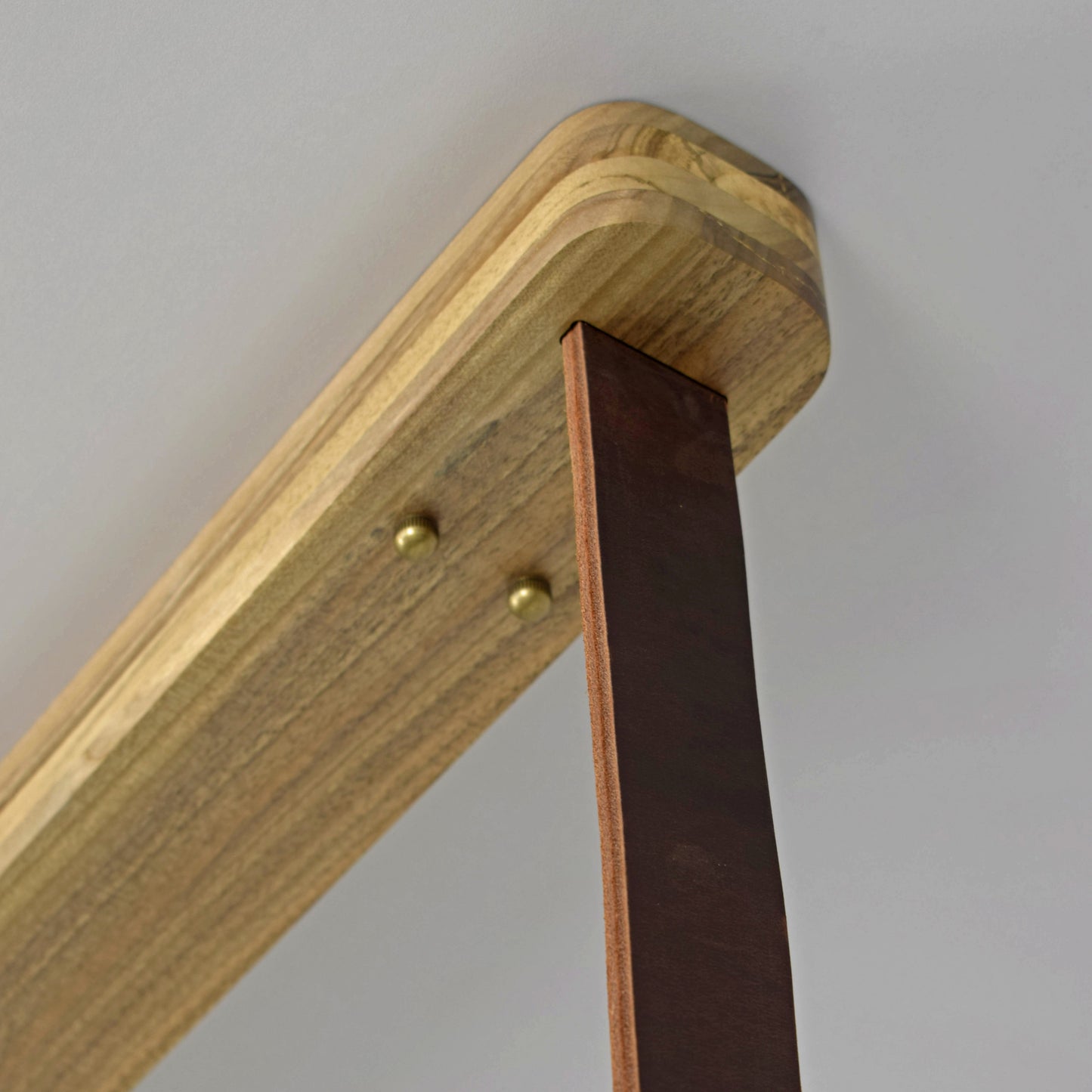 the fixture of the chandelier is made of solid walnut