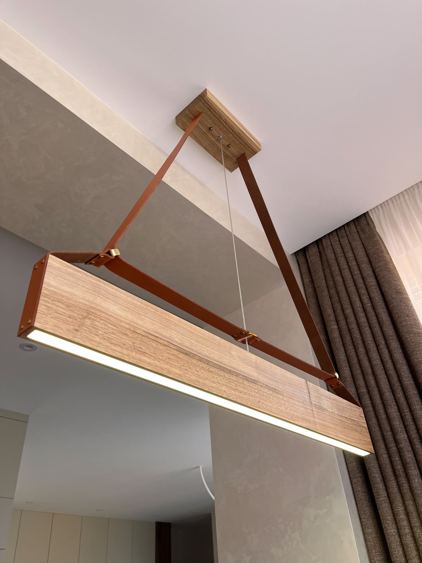made from solid wood Walnut with accent of genuine leather