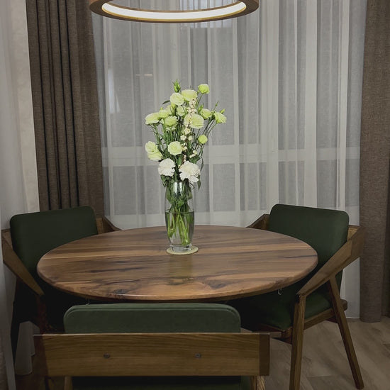 video review of the round chandelier in the kitchen